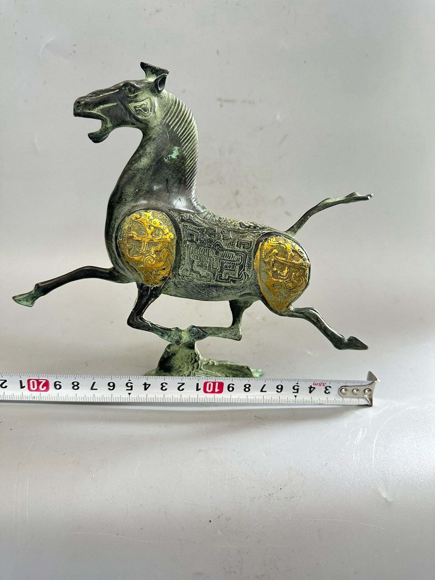 Pure copper antique gilded golden horse steps on a flying swallow