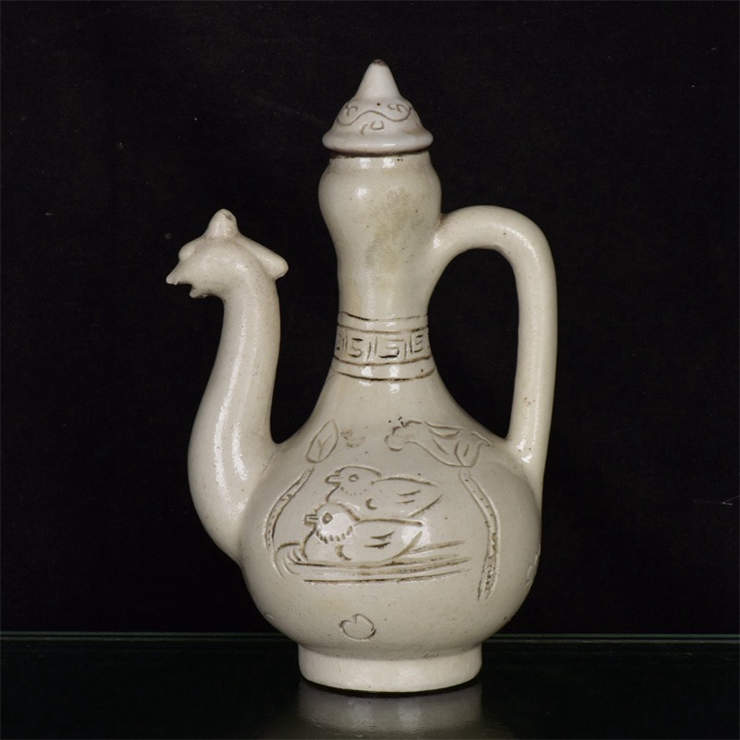Chinese antique relief phoenix head teapot