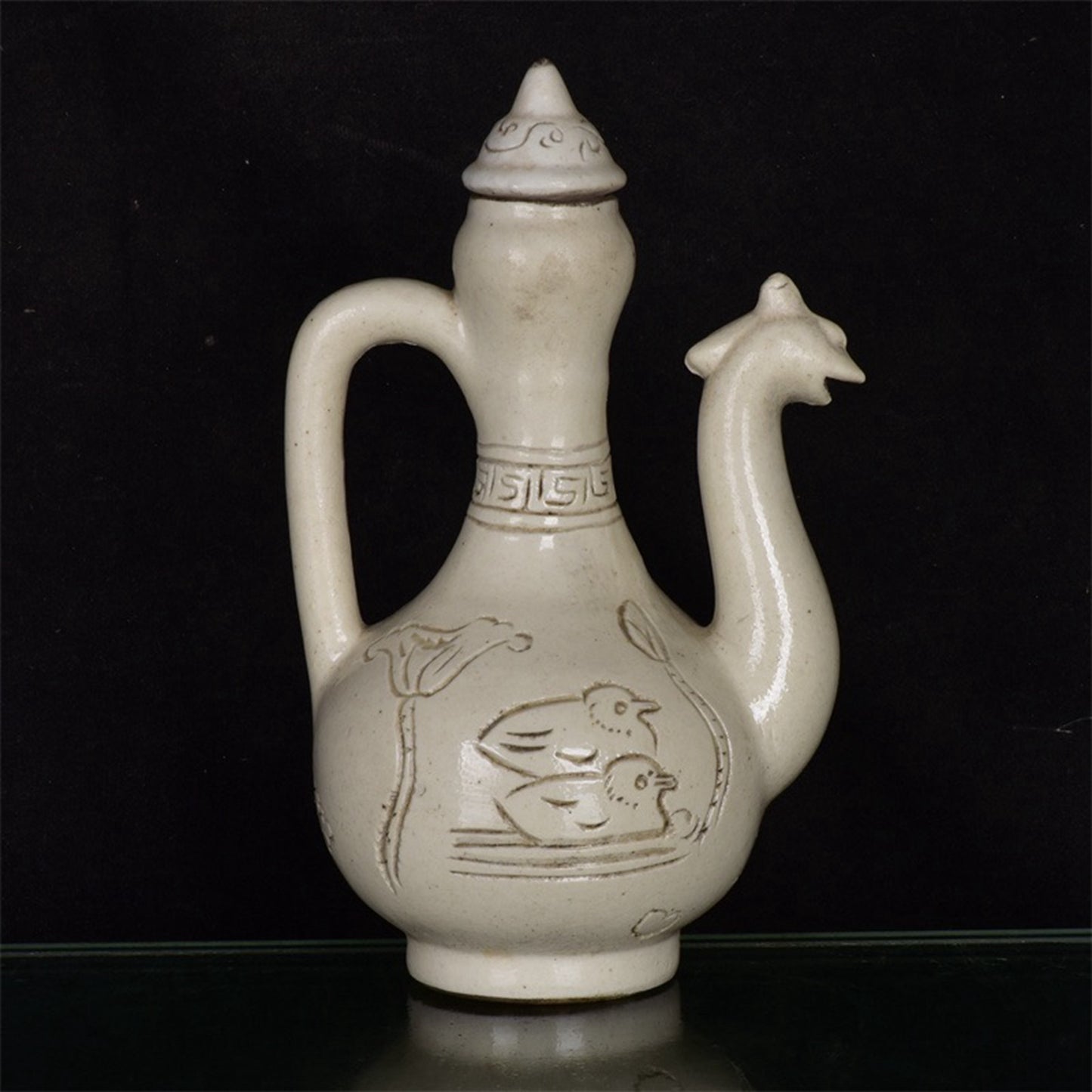 Chinese antique relief phoenix head teapot