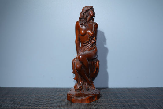 Small leaved boxwood carved female statue