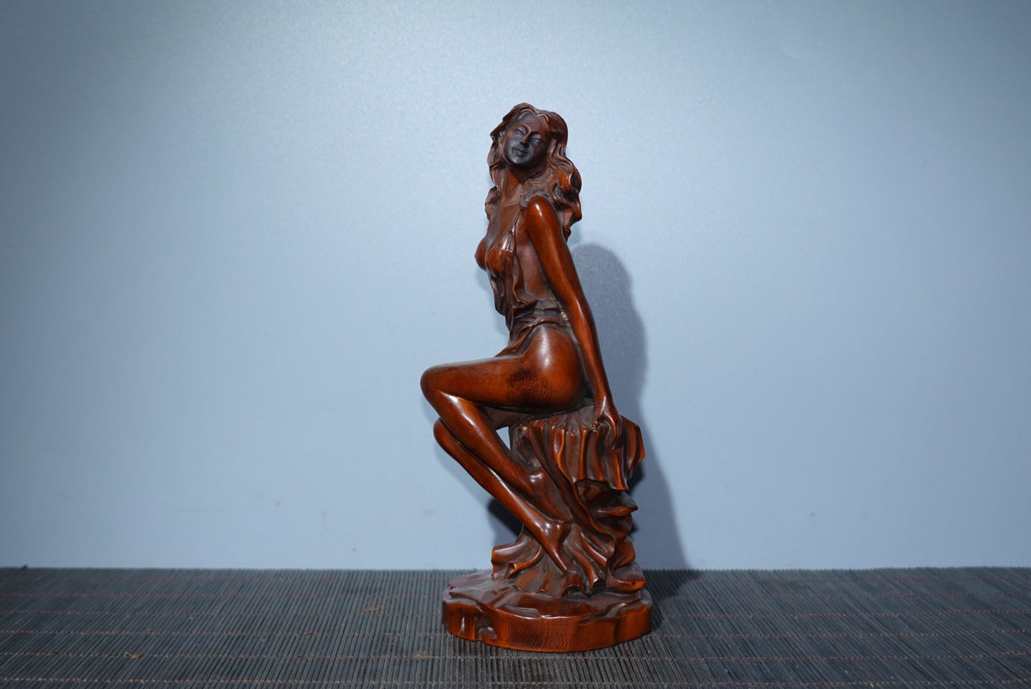 Small leaved boxwood carved female statue