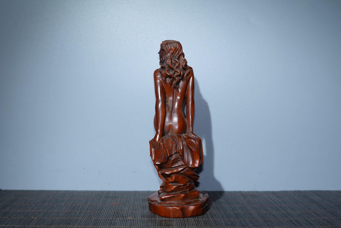 Small leaved boxwood carved female statue