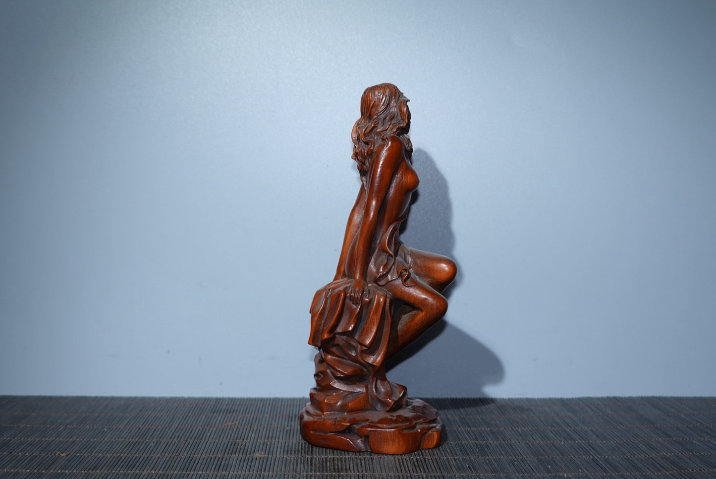 Small leaved boxwood carved female statue