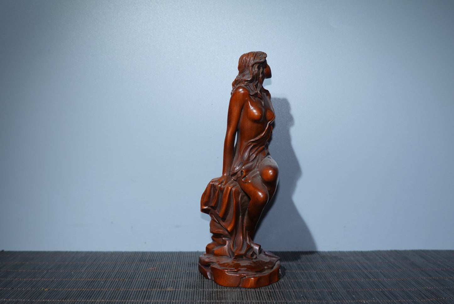 Small leaved boxwood carved female statue