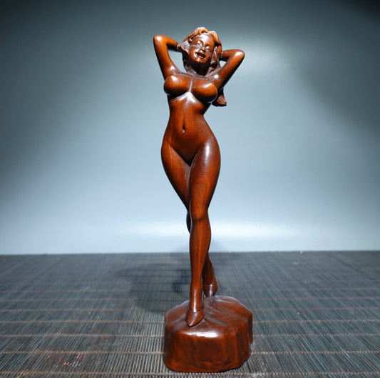 Small leaved boxwood carved female statue