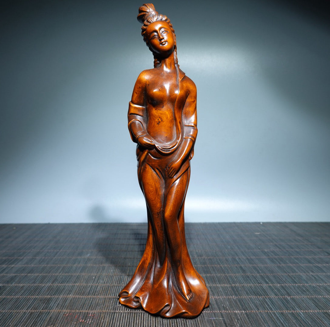 Small leaved boxwood carved female statue