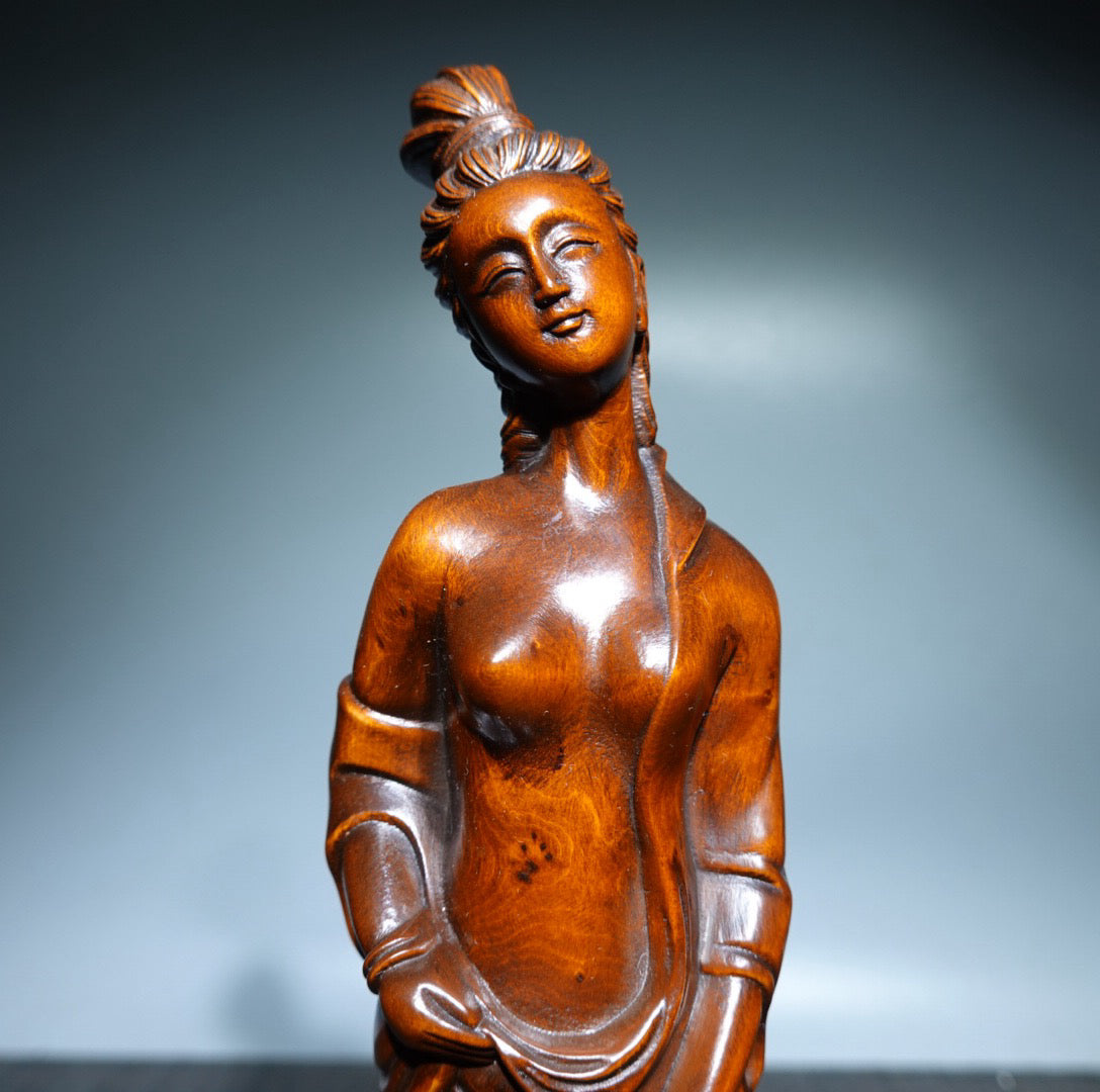 Small leaved boxwood carved female statue