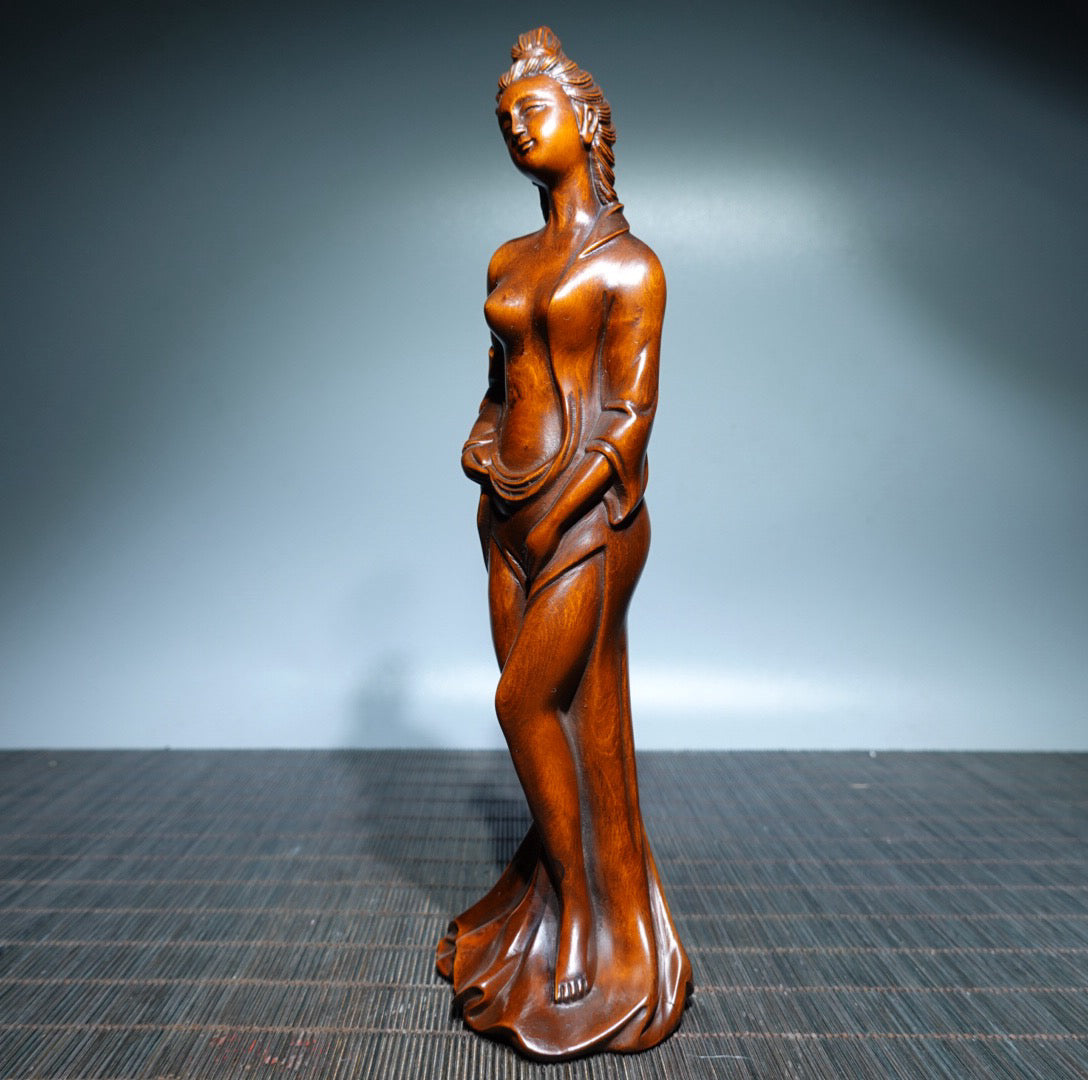 Small leaved boxwood carved female statue