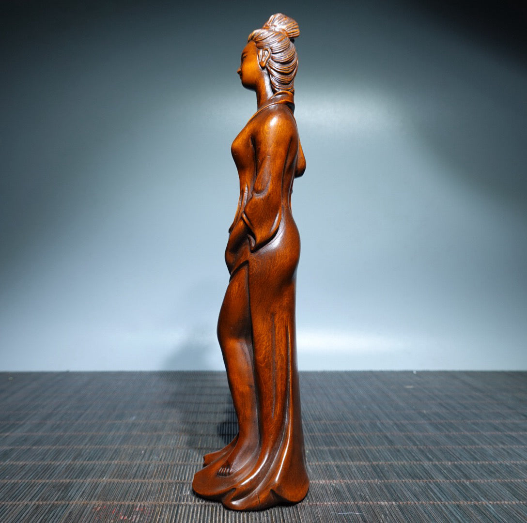 Small leaved boxwood carved female statue