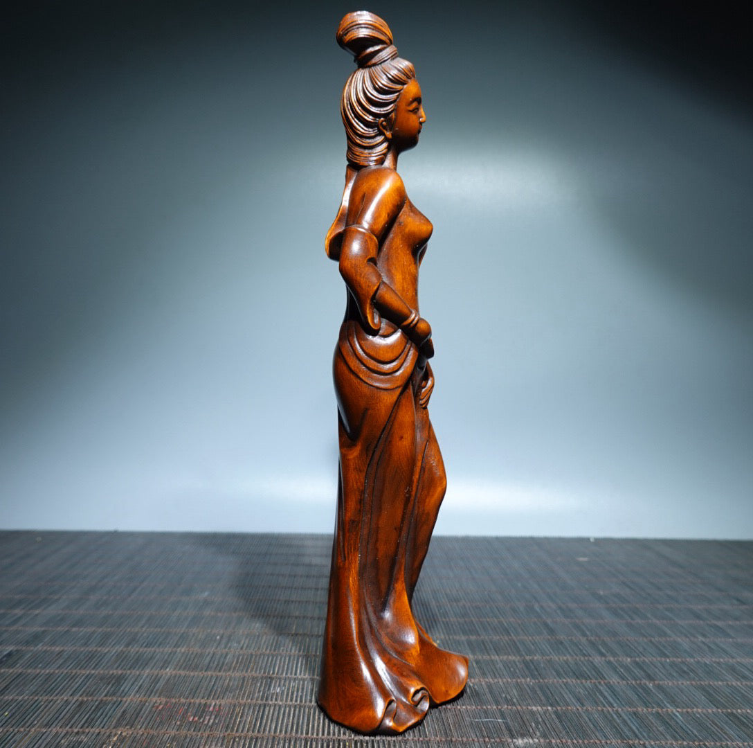 Small leaved boxwood carved female statue