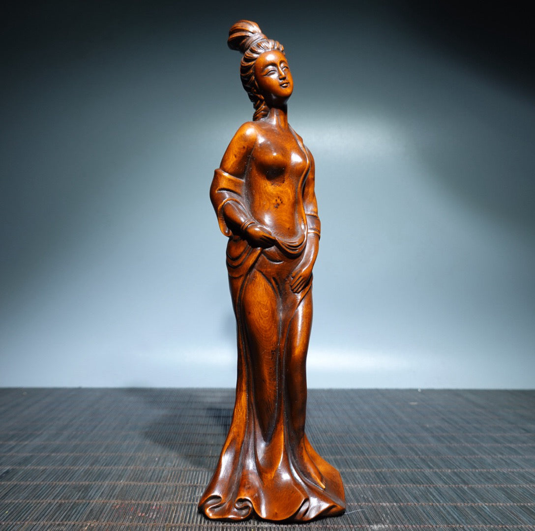 Small leaved boxwood carved female statue