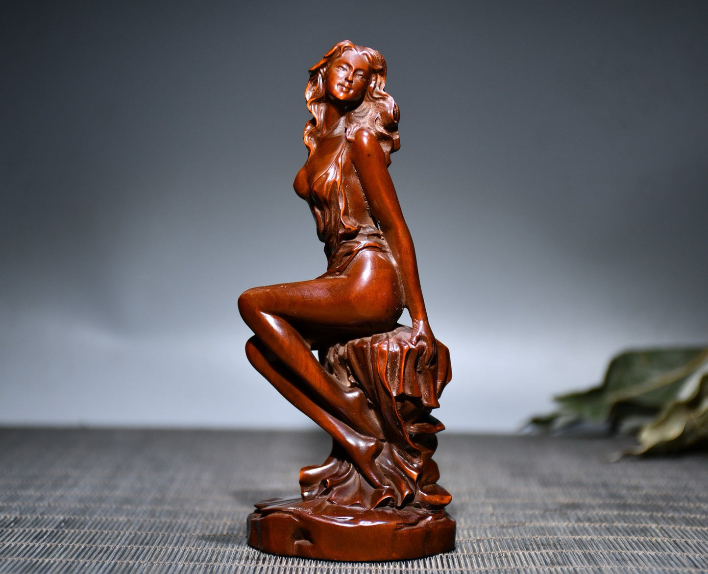 Small leaved boxwood carved female statue