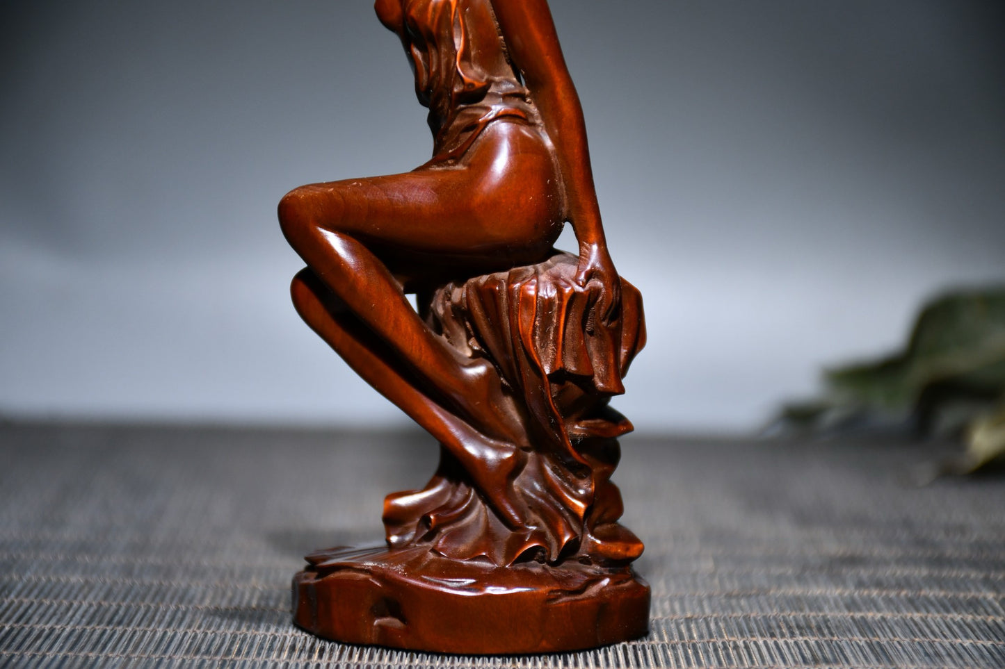 Small leaved boxwood carved female statue