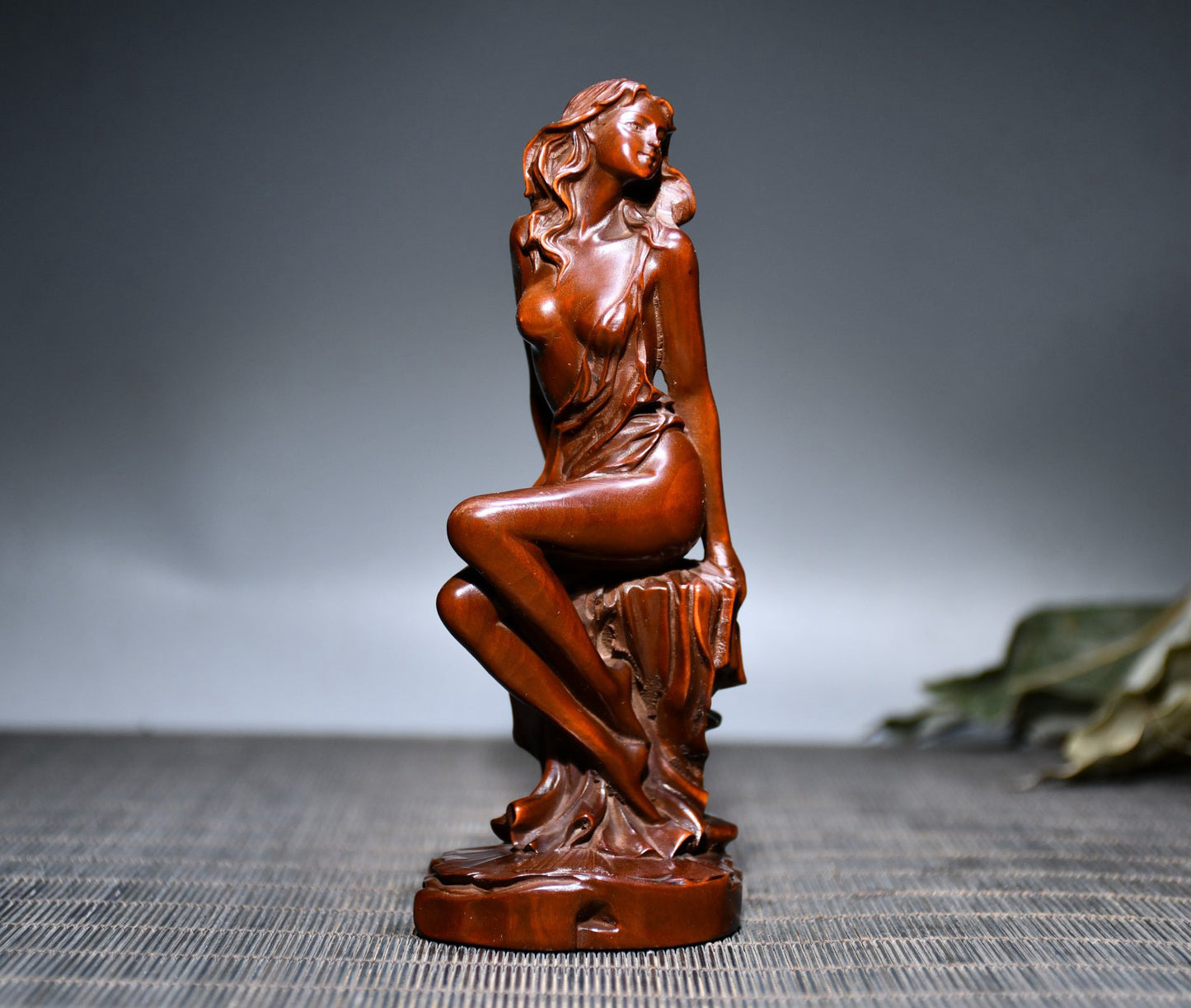 Small leaved boxwood carved female statue