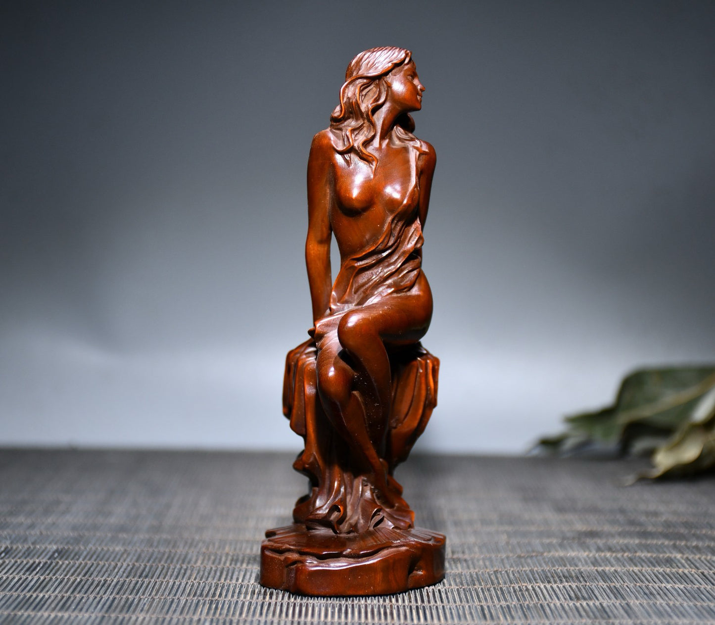 Small leaved boxwood carved female statue