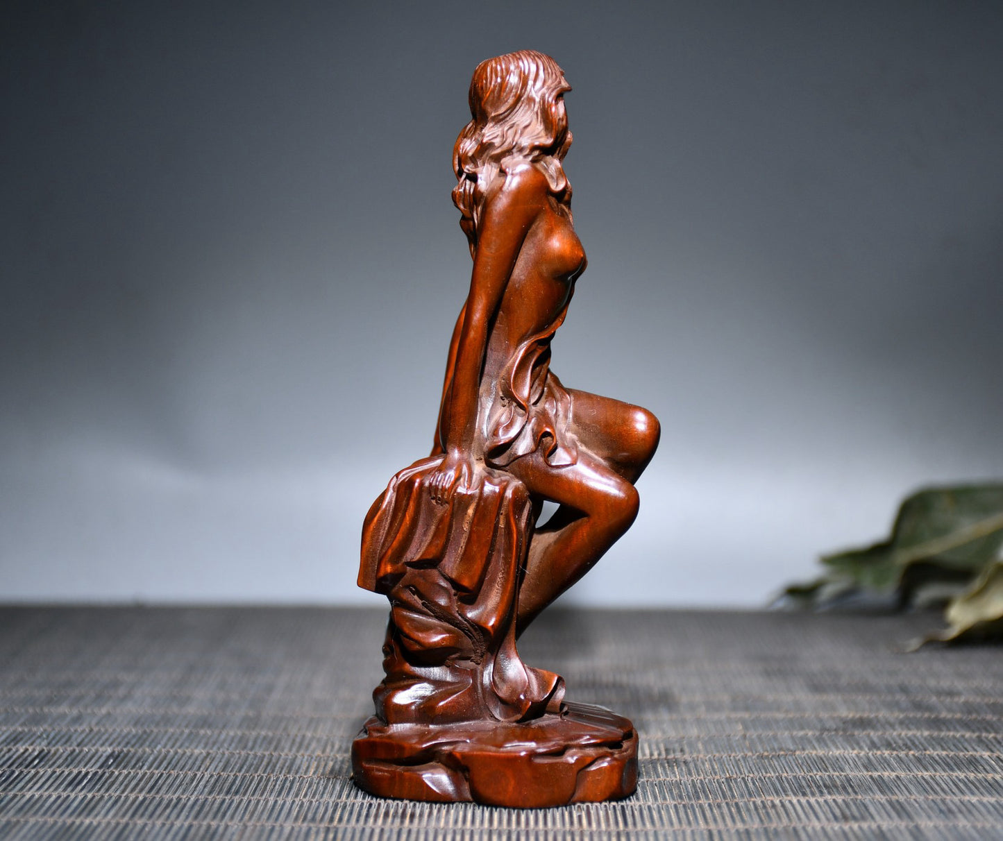 Small leaved boxwood carved female statue