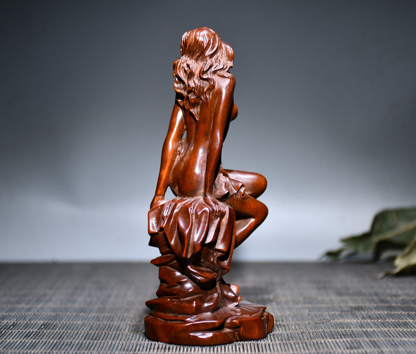 Small leaved boxwood carved female statue