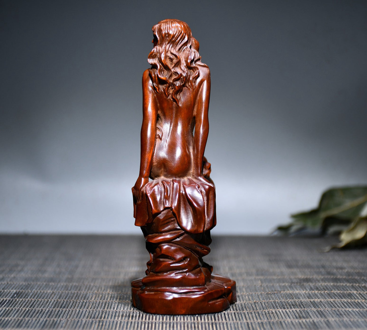 Small leaved boxwood carved female statue