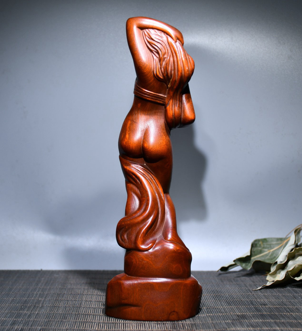 Small leaved boxwood carved female statue