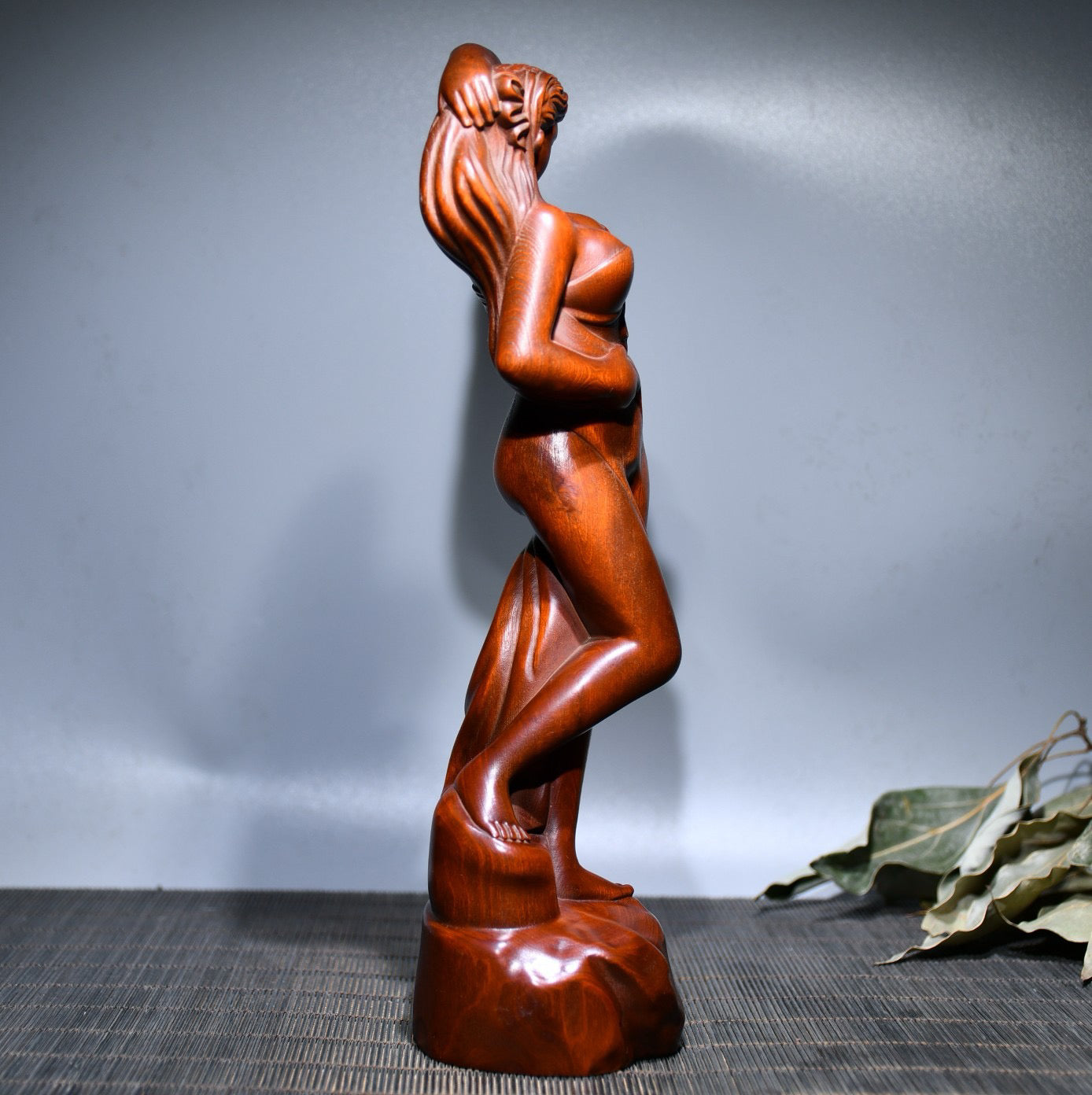 Small leaved boxwood carved female statue