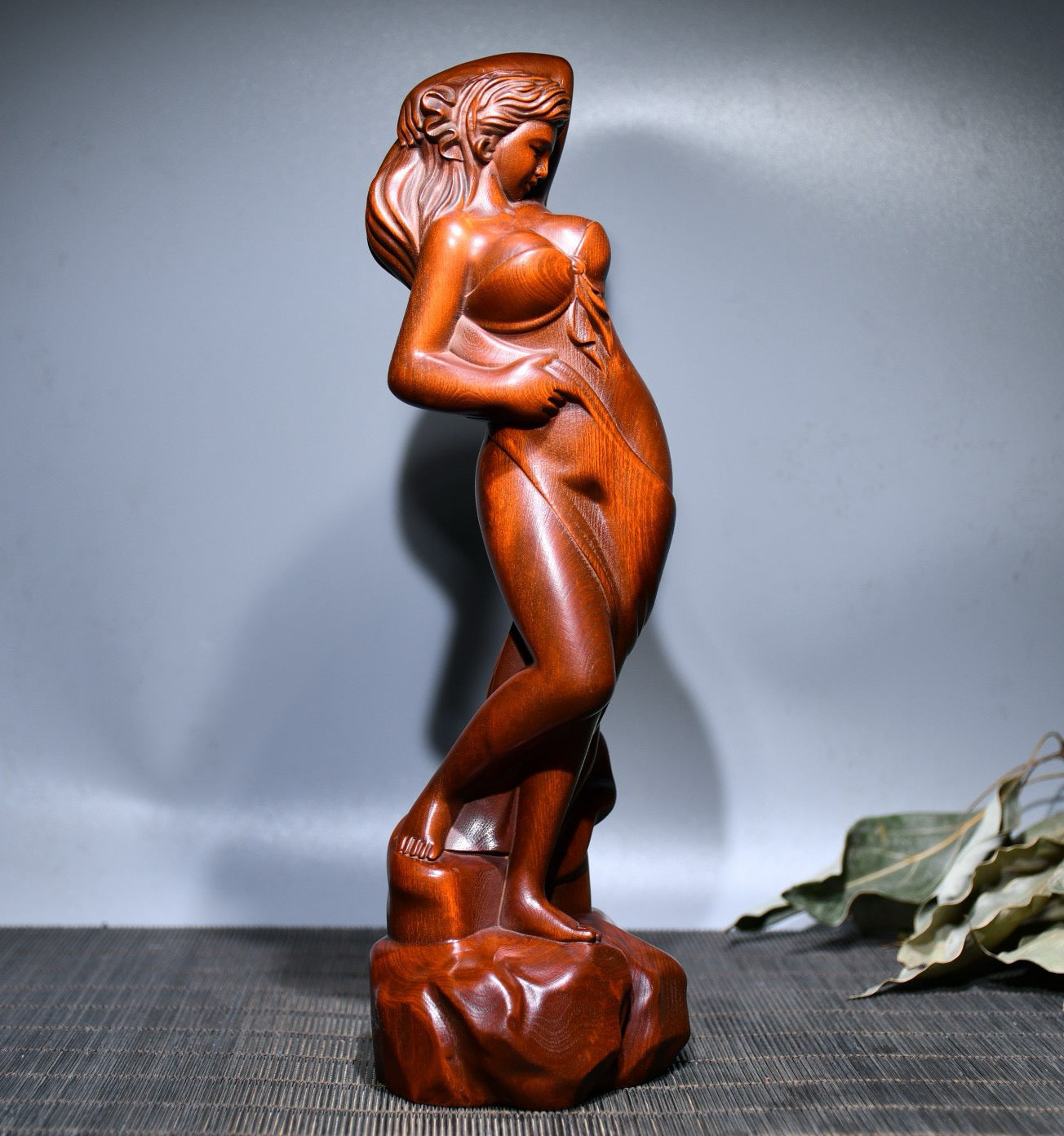 Small leaved boxwood carved female statue