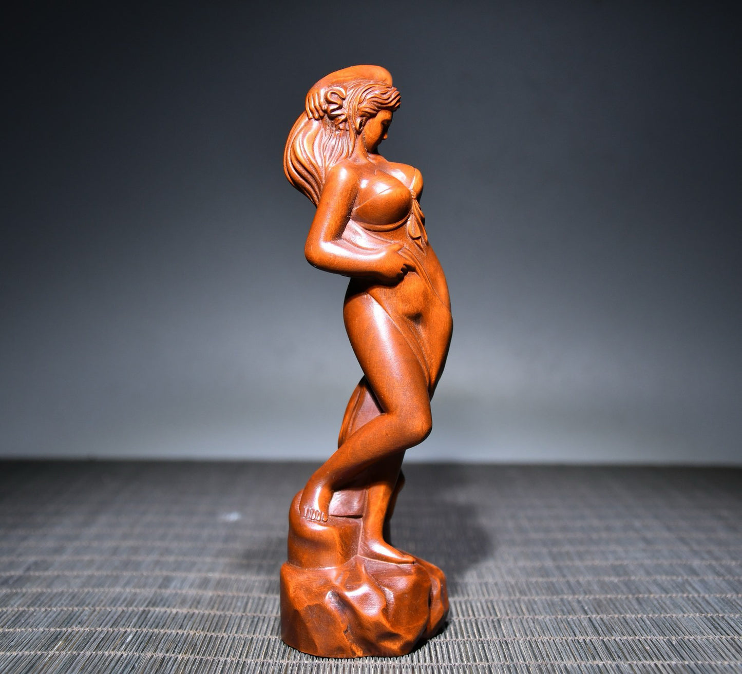 Small leaved boxwood carved female statue