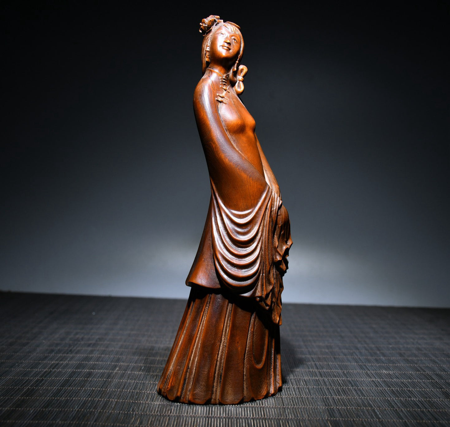 Small leaved boxwood carved female statue