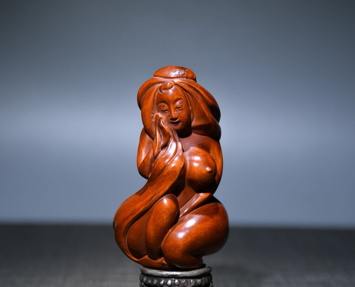 Small leaved boxwood carved female statue