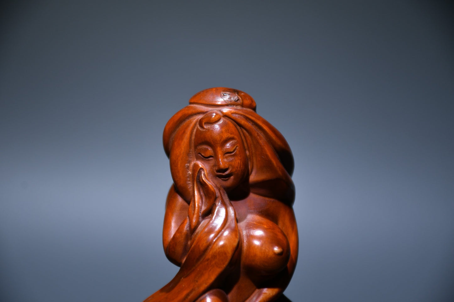 Small leaved boxwood carved female statue