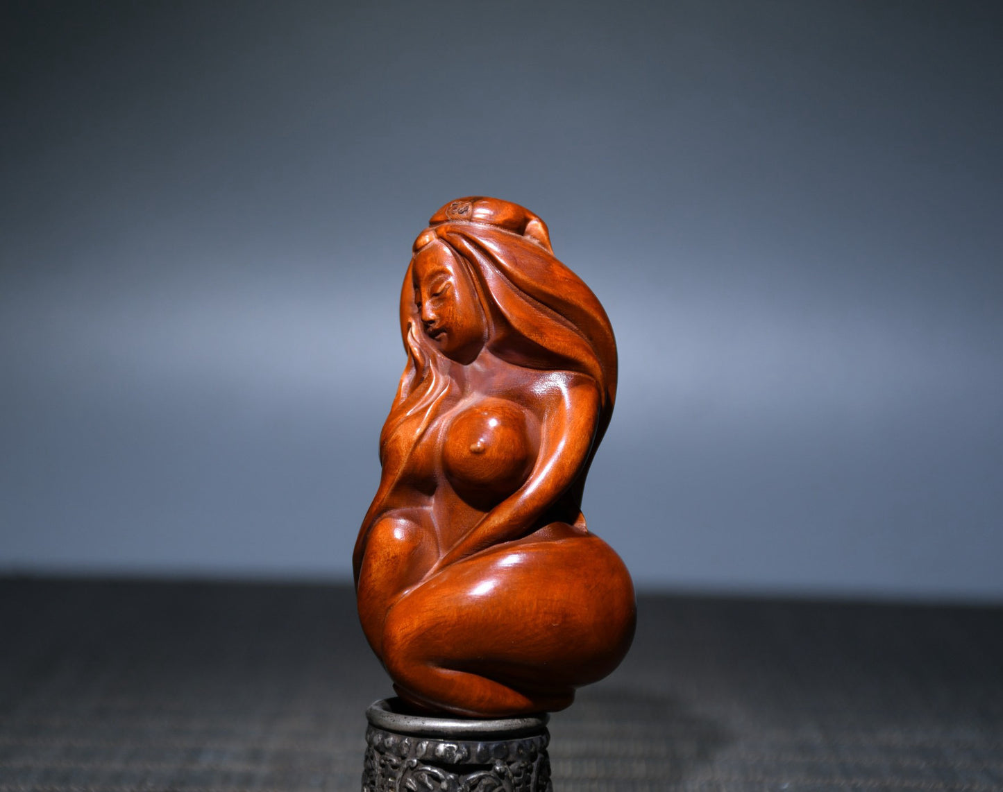 Small leaved boxwood carved female statue