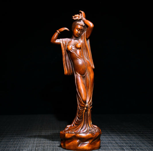 Huangyang wood is exquisitely carved into a statue of a beautiful woman in Xishi