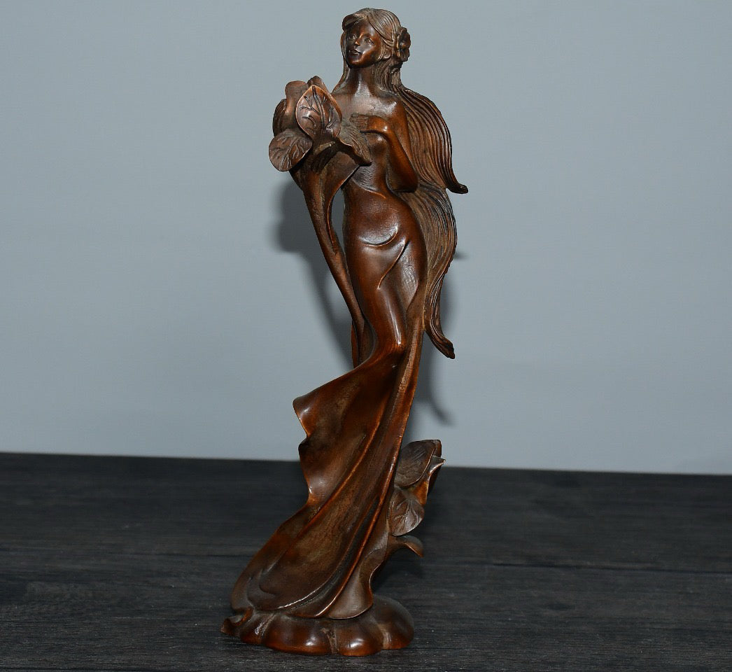 Small leaved boxwood Western female statue