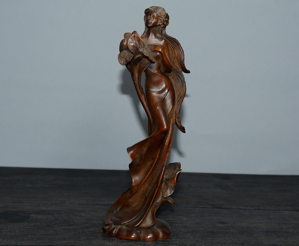 Small leaved boxwood Western female statue