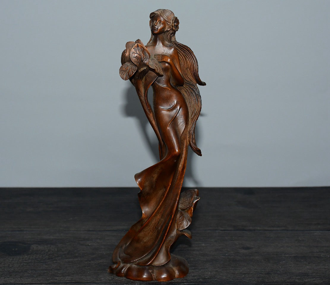 Small leaved boxwood Western female statue