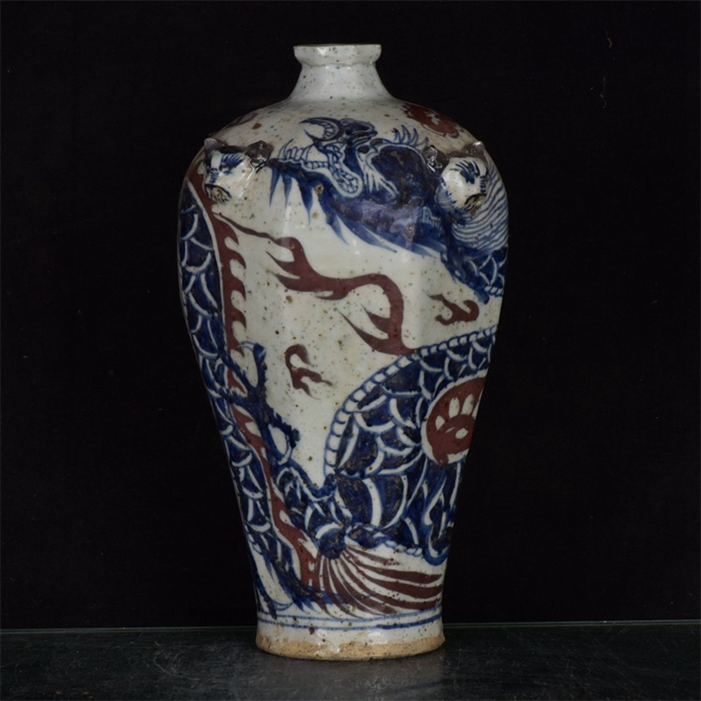 Chinese antique blue and white glazed red dragon patterned silk lion head plum vase
