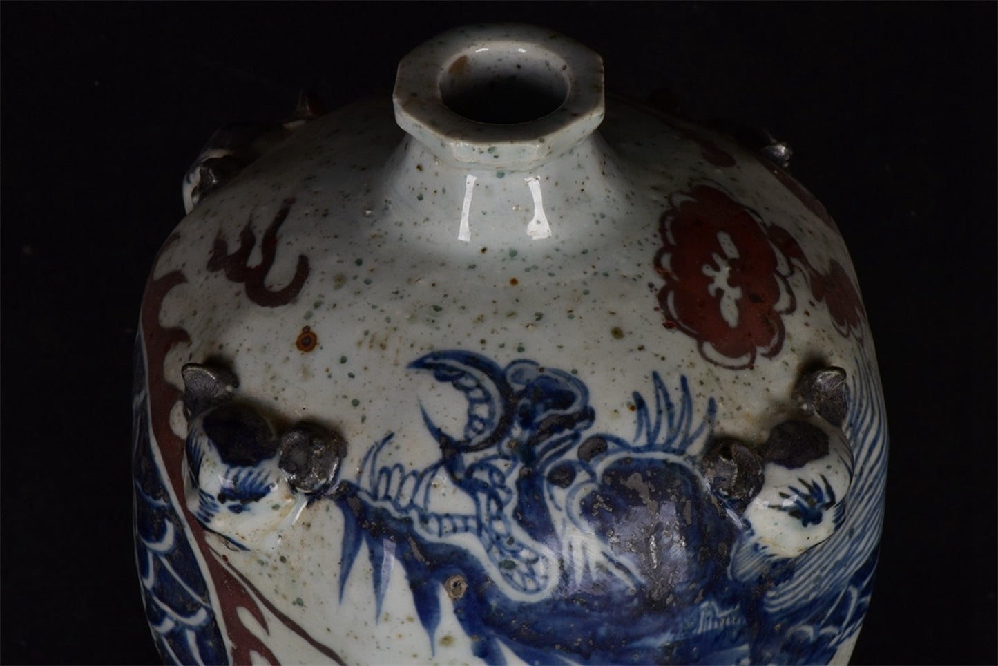 Chinese antique blue and white glazed red dragon patterned silk lion head plum vase