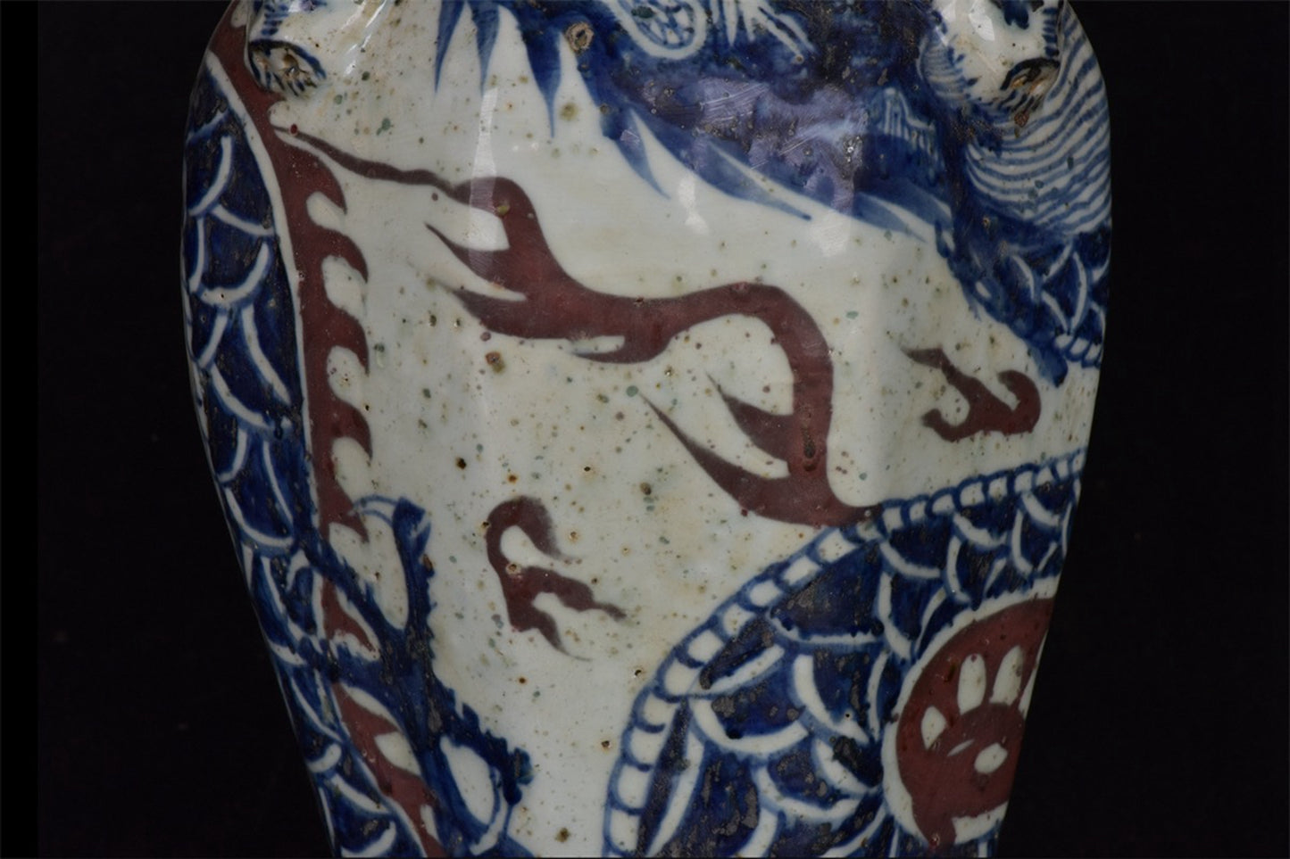 Chinese antique blue and white glazed red dragon patterned silk lion head plum vase