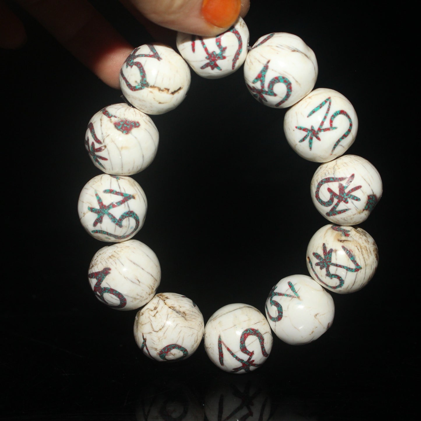 Handcarved Chinese antique seashells inlaid with red pine, green pine, and Tibetan bracelets