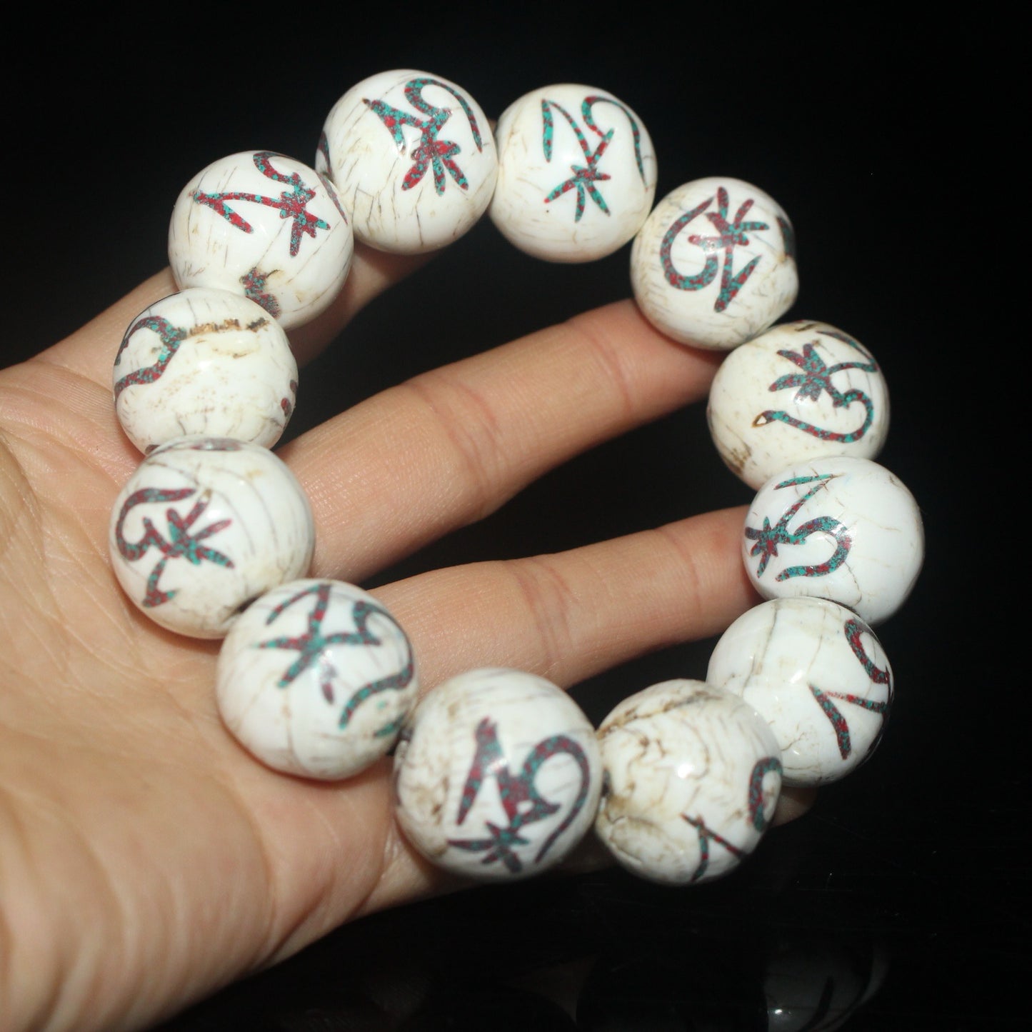 Handcarved Chinese antique seashells inlaid with red pine, green pine, and Tibetan bracelets