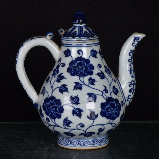 Chinese antique blue and white pear shaped teapot with tangled branches and floral patterns
