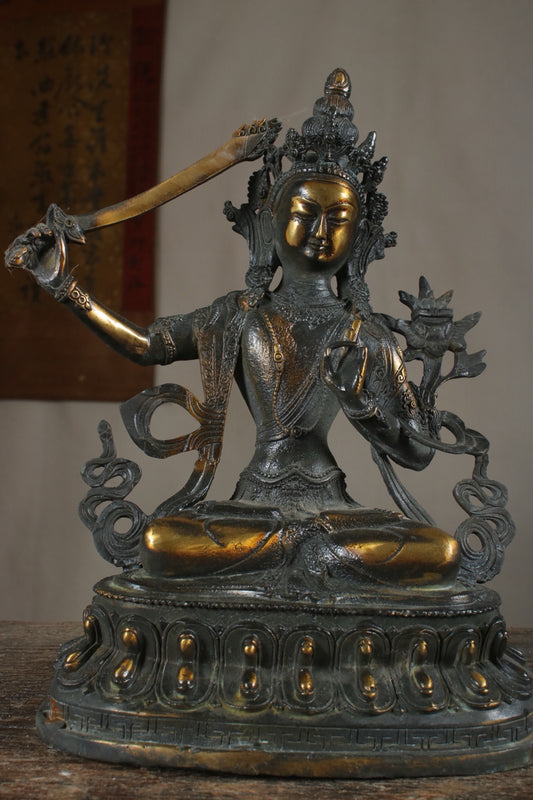 A finely crafted Manjushri Bodhisattva with copper gilded gold craftsmanship