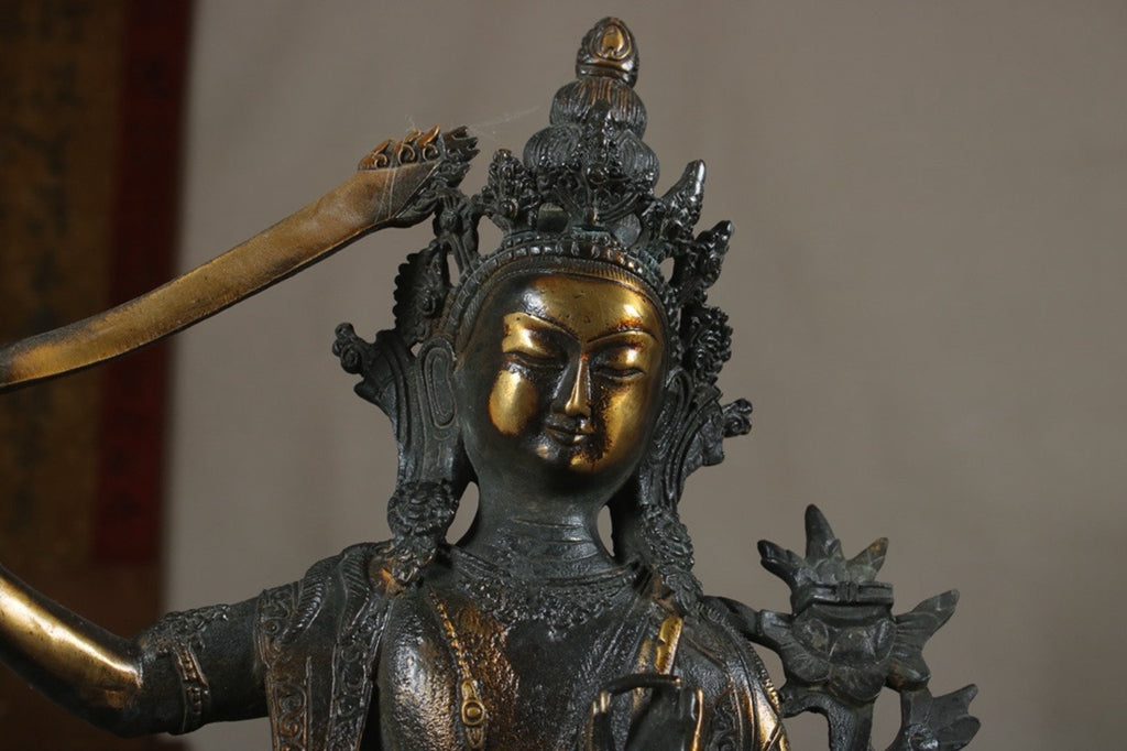 A finely crafted Manjushri Bodhisattva with copper gilded gold craftsmanship