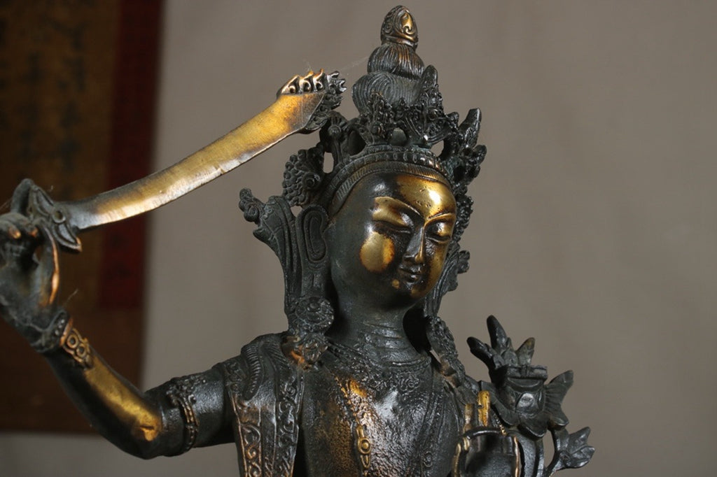 A finely crafted Manjushri Bodhisattva with copper gilded gold craftsmanship