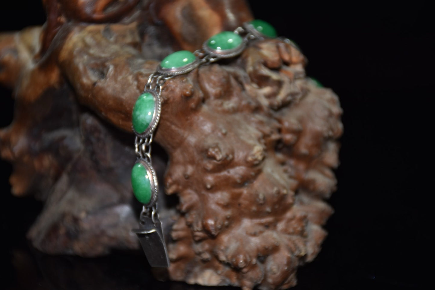 Early collection of sterling silver inlaid emerald gemstone bracelet ornaments