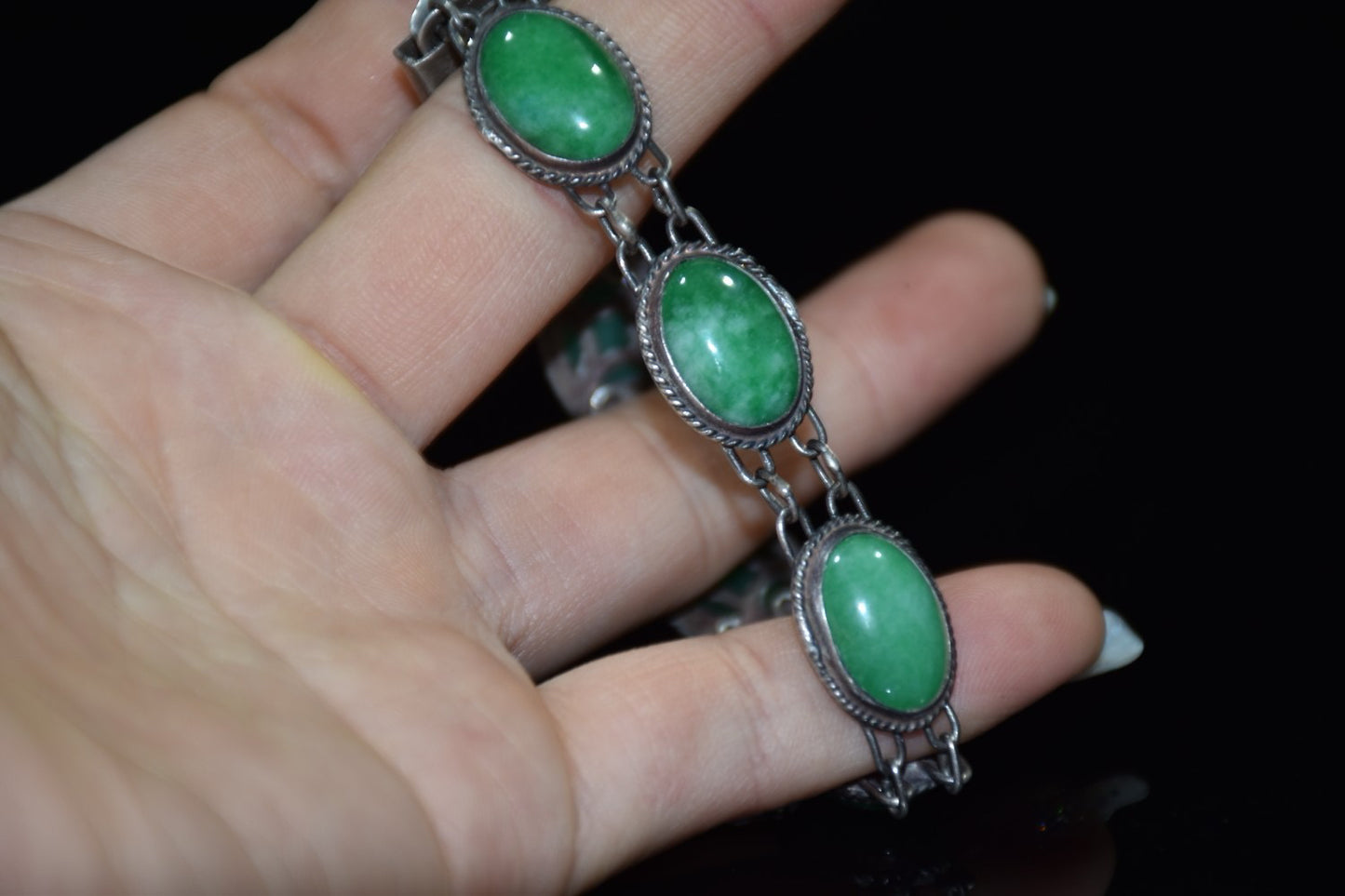 Early collection of sterling silver inlaid emerald gemstone bracelet ornaments