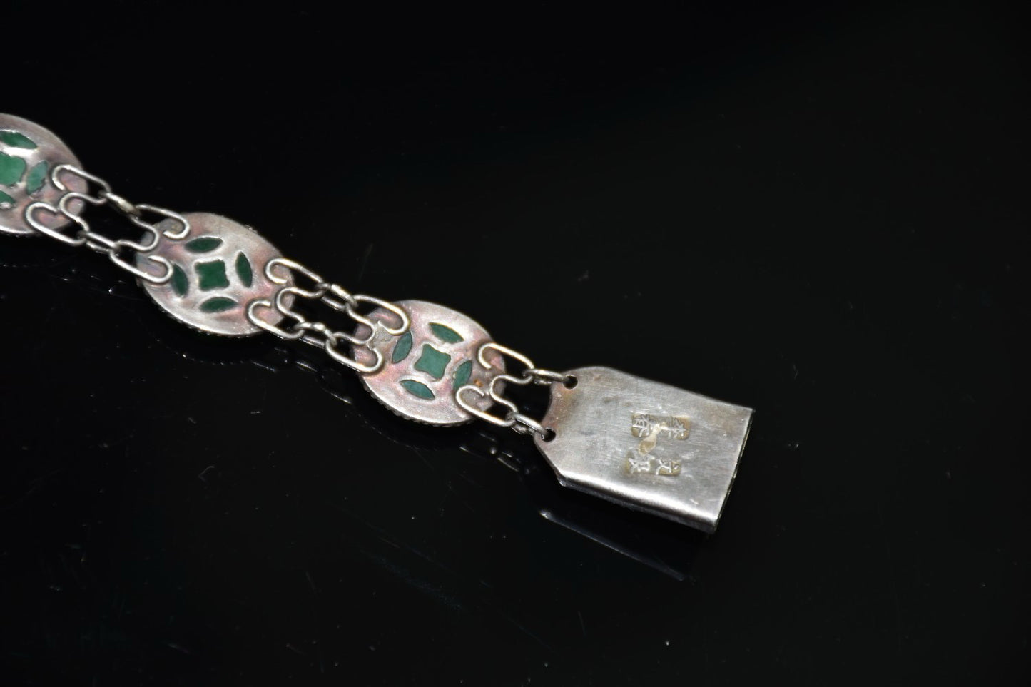 Early collection of sterling silver inlaid emerald gemstone bracelet ornaments