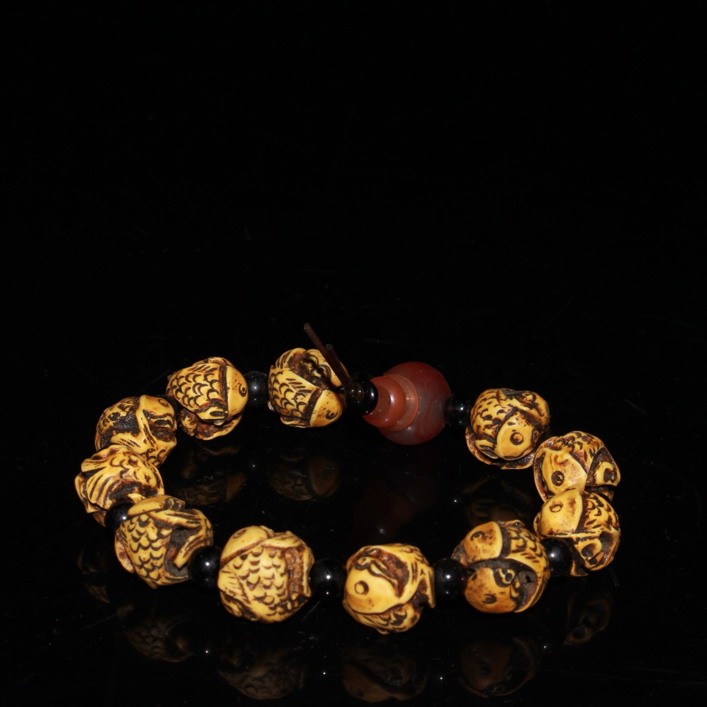 Early collection of ox bone carvings, annual fish bracelet ornaments