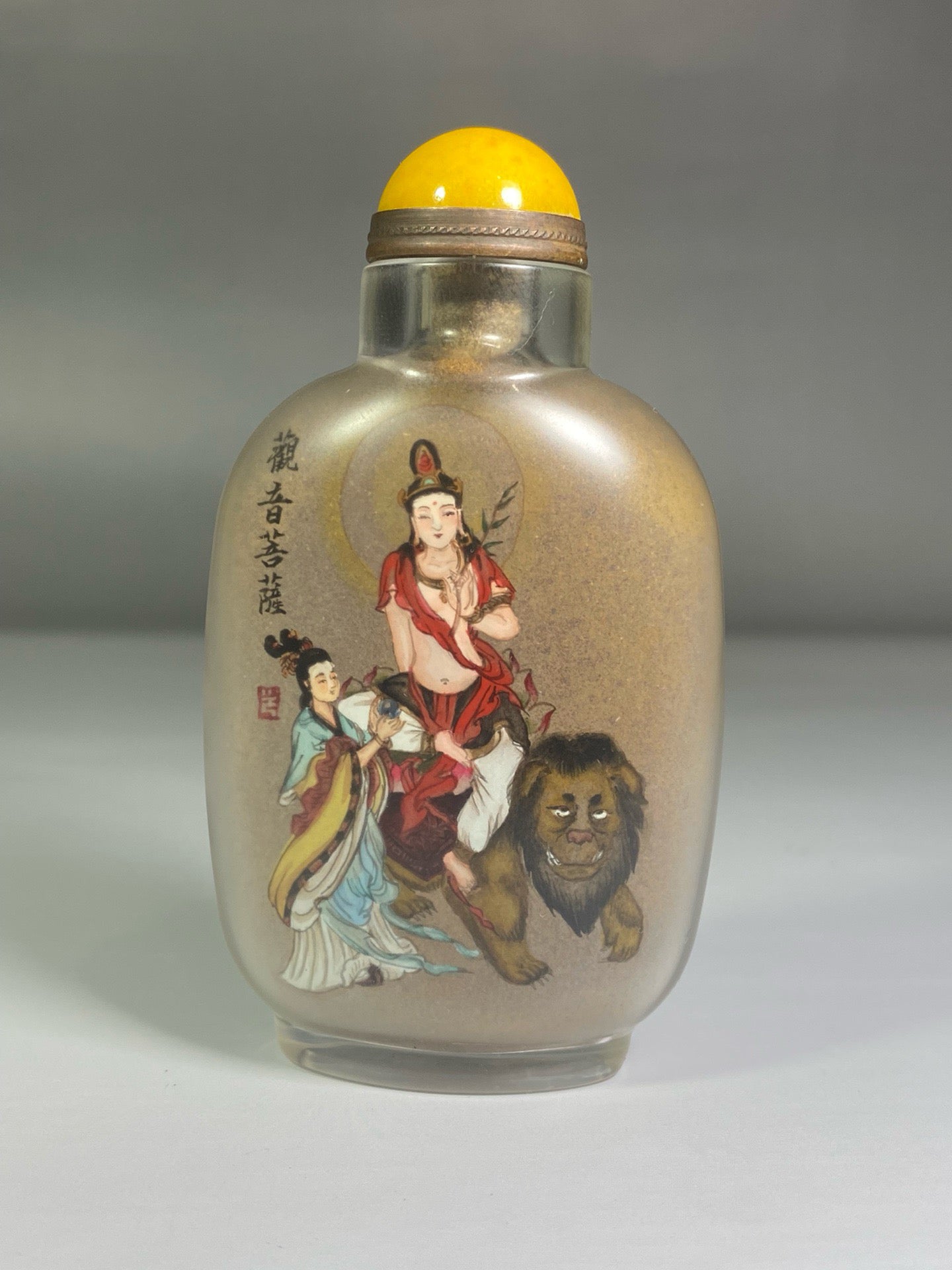 A set of Chinese antique glass inner paintings depicting the four great bodhisattvas and a snuff bottle