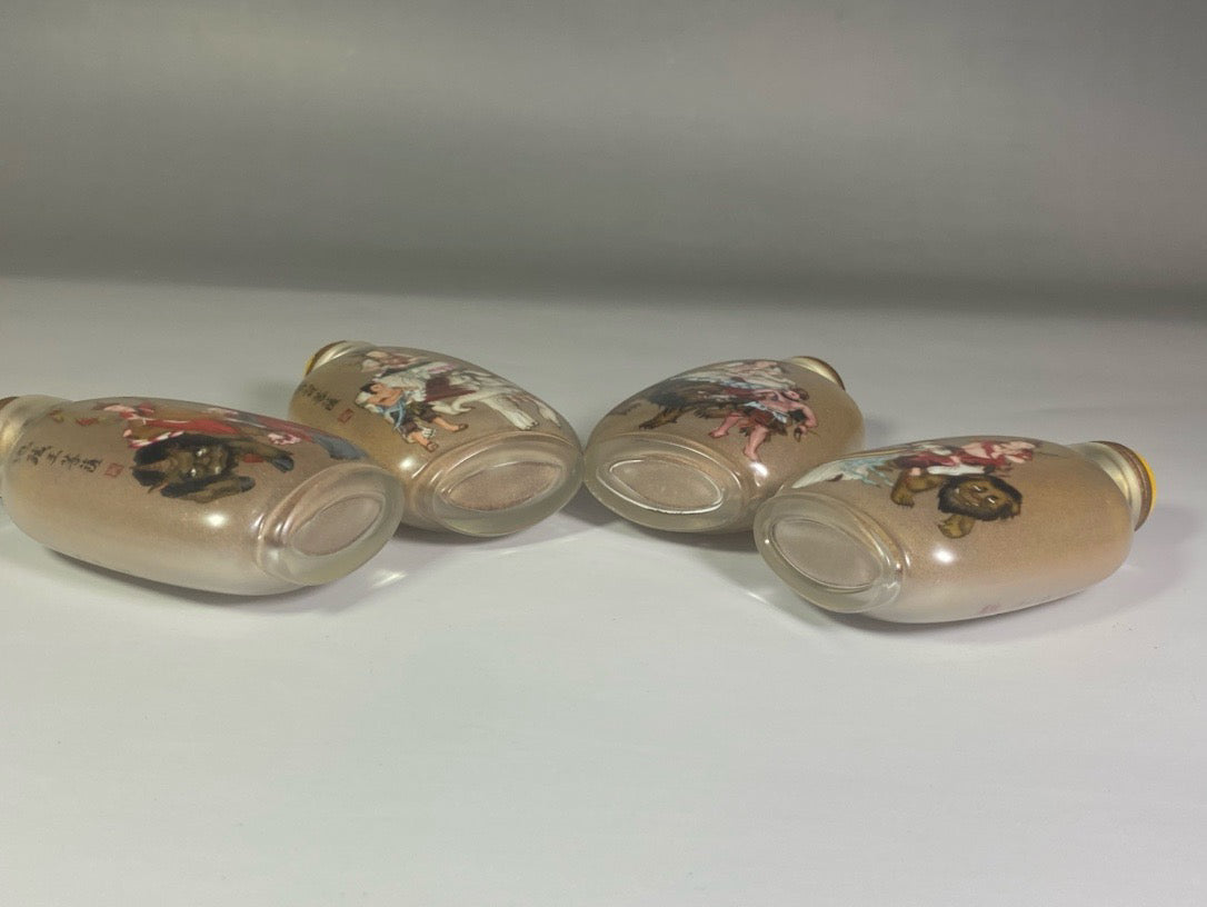 A set of Chinese antique glass inner paintings depicting the four great bodhisattvas and a snuff bottle