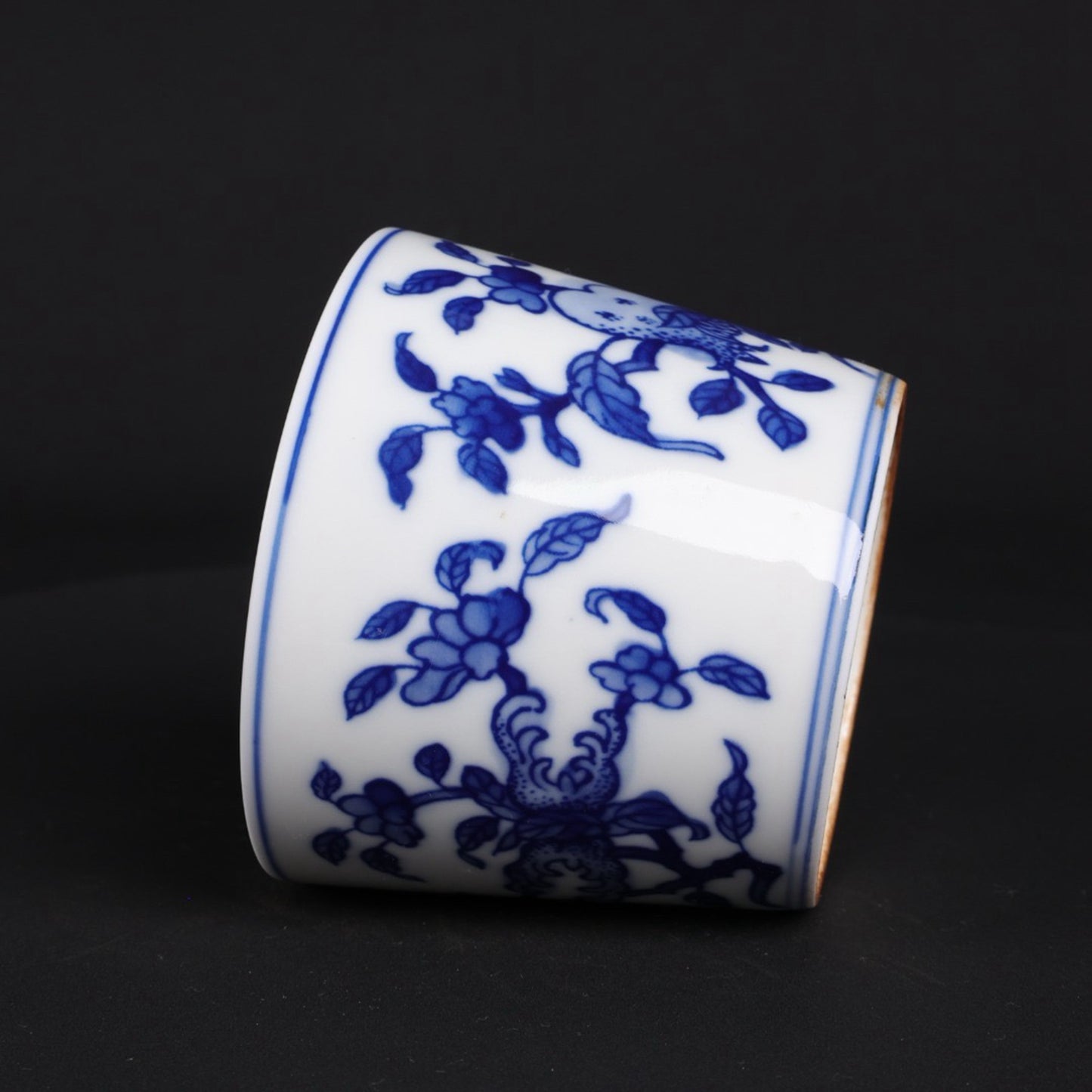 A pair of blue and white lucky, lucky, and longevity patterned cups